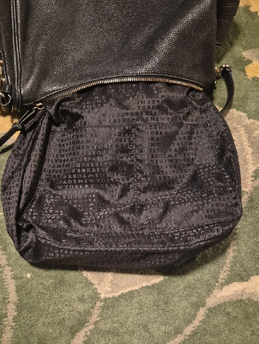 kate spade black pebble leather crossbody with gold logo